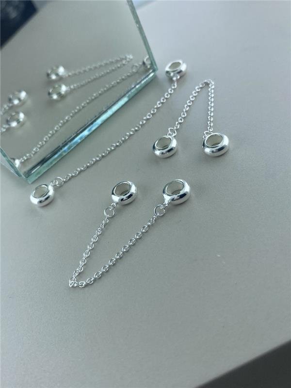 TRAVA ABAULADA C/CORRENTINHA