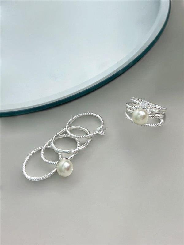 ANEL QUATRO EM UM PÉROLA E PONTO LUZ