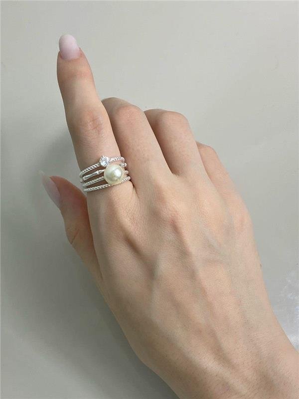 ANEL QUATRO EM UM PÉROLA E PONTO LUZ