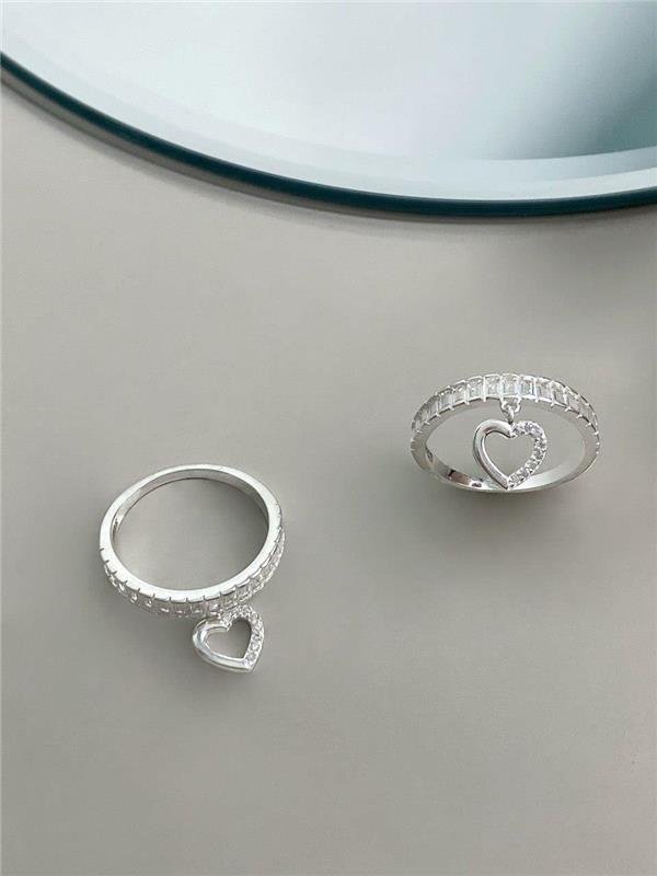 ANEL C/PINGENTE CORAÇÃO ZIRCÔNIA NAVETE