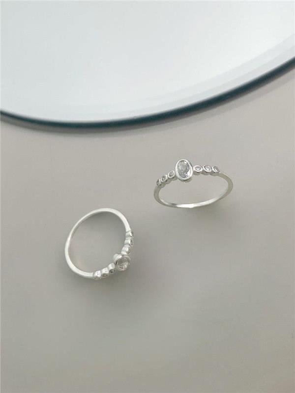 ANEL DETALHE OVAL C/PONTO LUZ