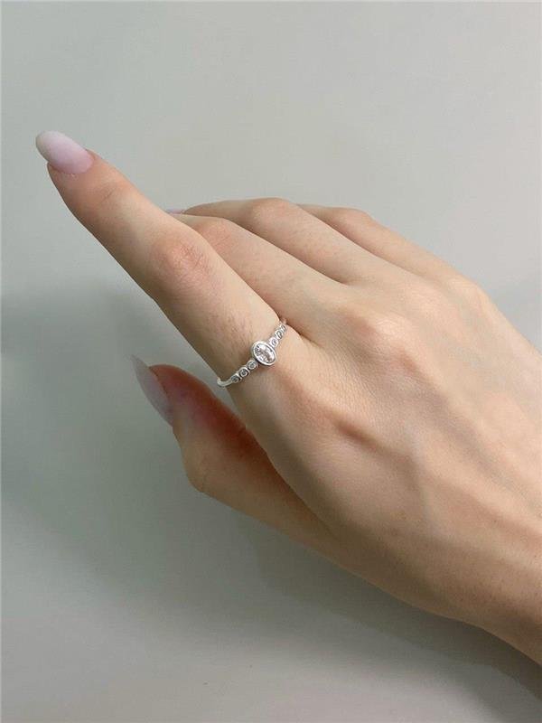 ANEL DETALHE OVAL C/PONTO LUZ