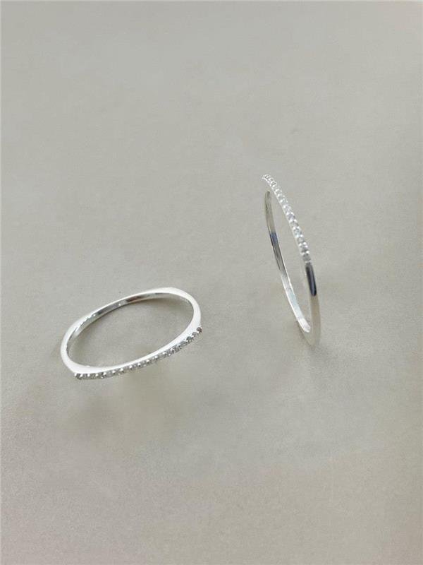 APARADOR DE ALIANÇA FIO FINO ZIRCÔNIA (UN)