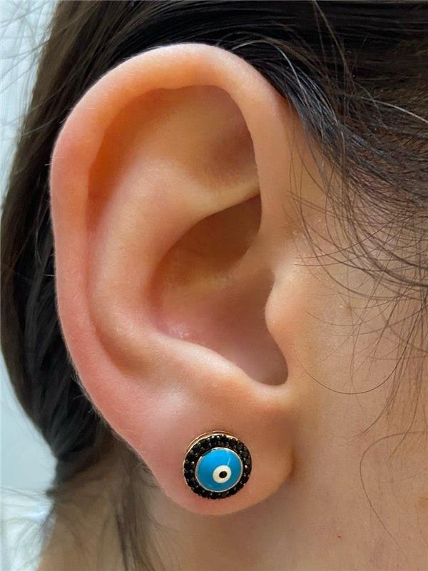 BRINCO REDONDO OLHO GREGO