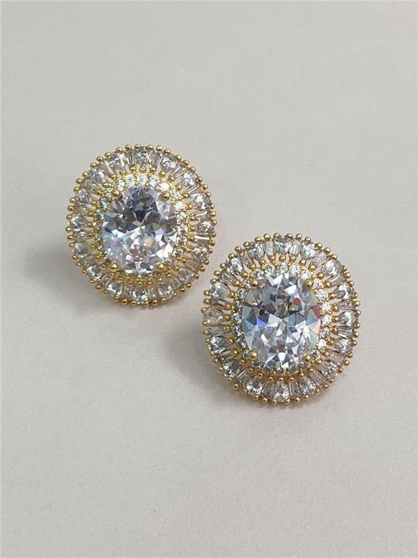 BRINCO OVAL PONTO LUZ